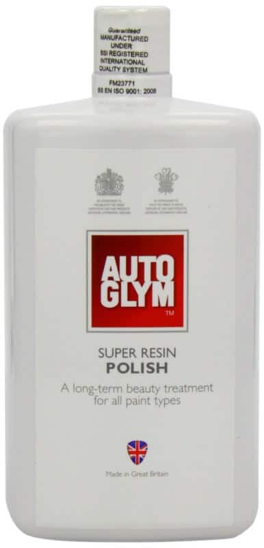 Image of an "Auto Glym Super Resin Polish" bottle. The label mentions it is a long-term beauty treatment for all paint types, ideal for car detailing, and is made in Great Britain with various certifications displayed.