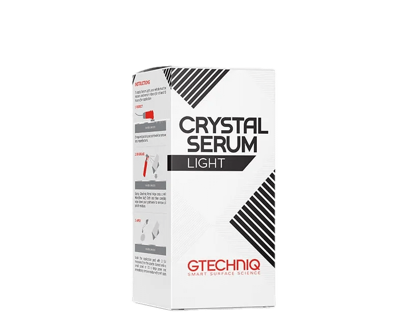 A white Gtechniq Crystal Serum Light box with black and red text and graphics, ideal for car valeting. The box includes instructions on the side for application.